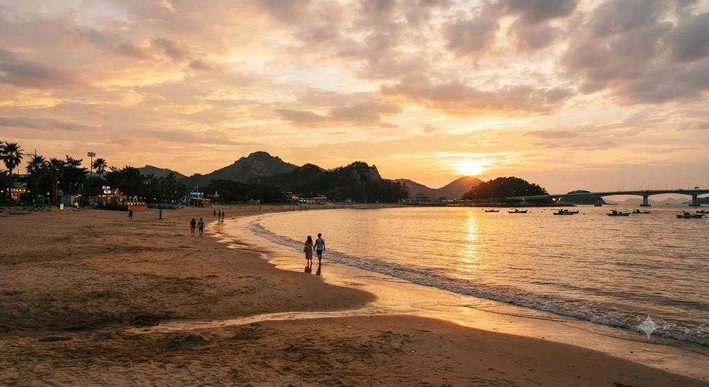 Scenic sunset view over the golden sandy shore of Wonsan Beach in Wonsando Island, South Korea.